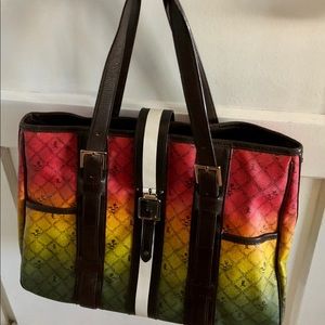 L.A.M.B. SIGNATURE OMBRÉ RASTA SATCHEL BAG.